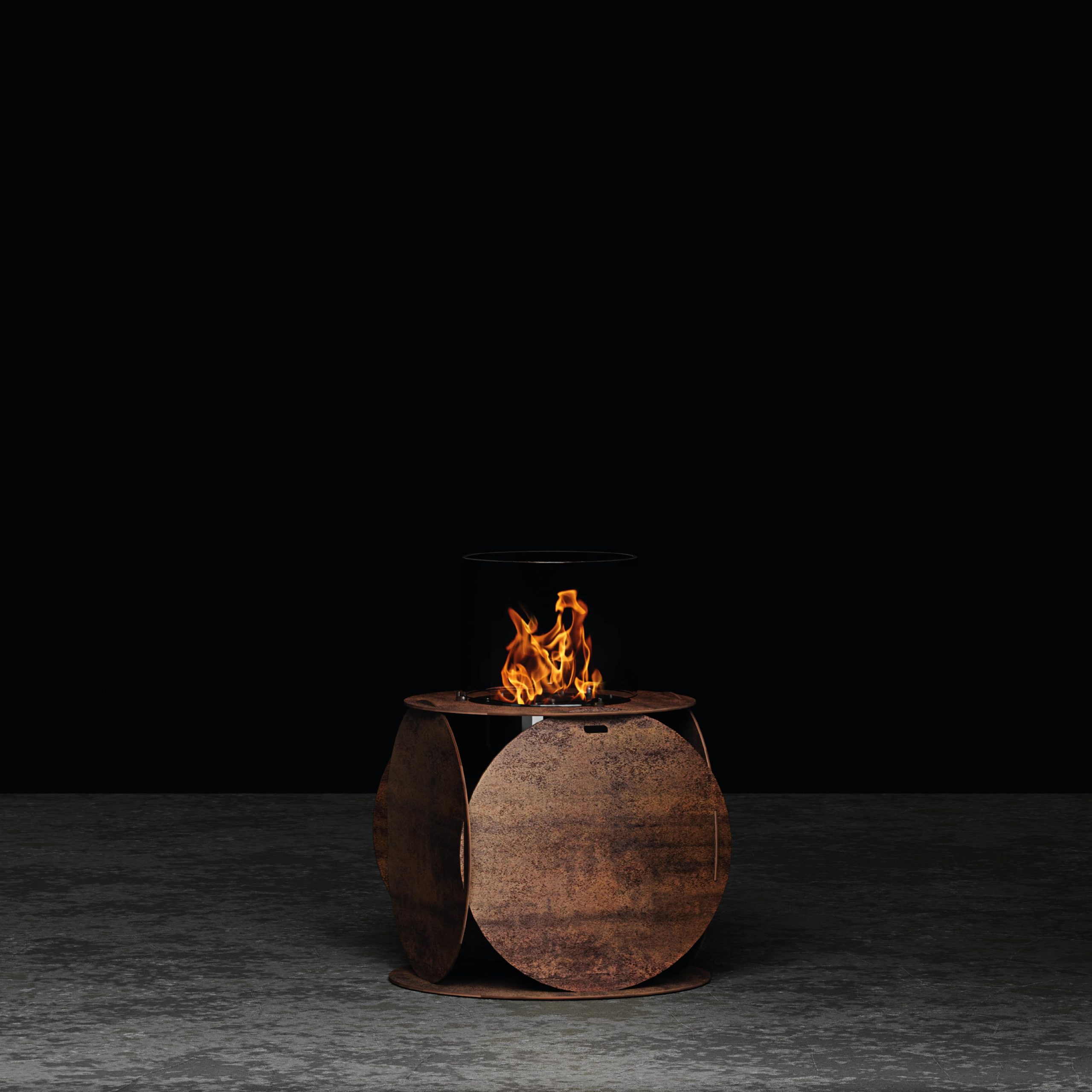 Lira bioethanol fire pit by GlammFire with rusted steel finish and circular design