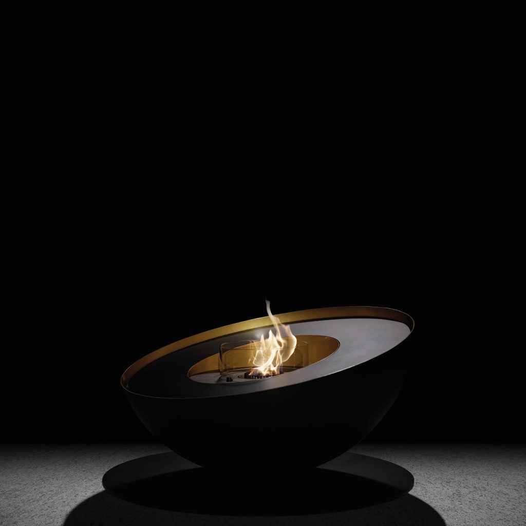 Mileto bioethanol floor fireplace by GlammFire in an elegant angled view, showcasing its modern design and eco-friendly flame.