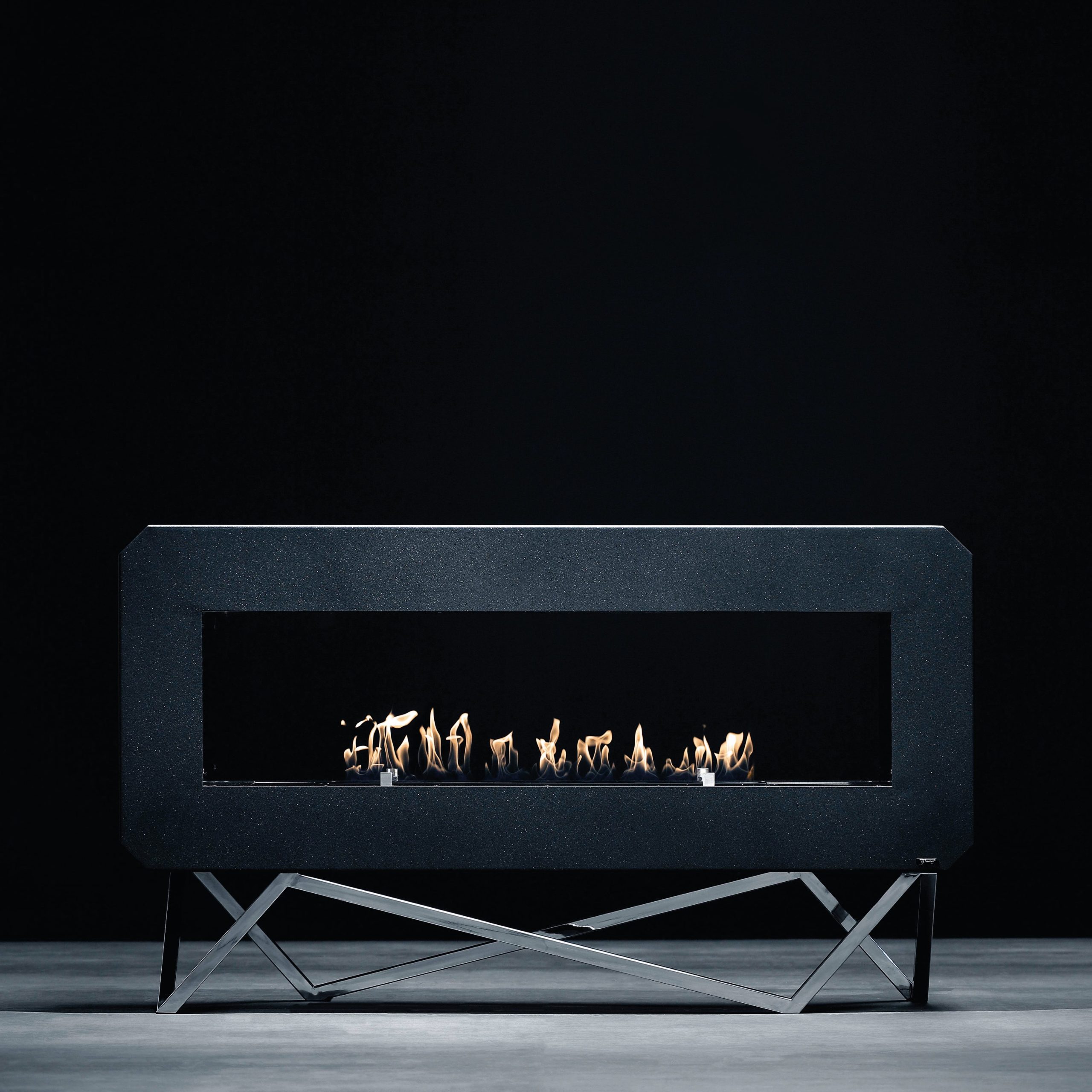 Urban bioethanol floor fireplace by GlammFire in black finish with modern geometric metal legs