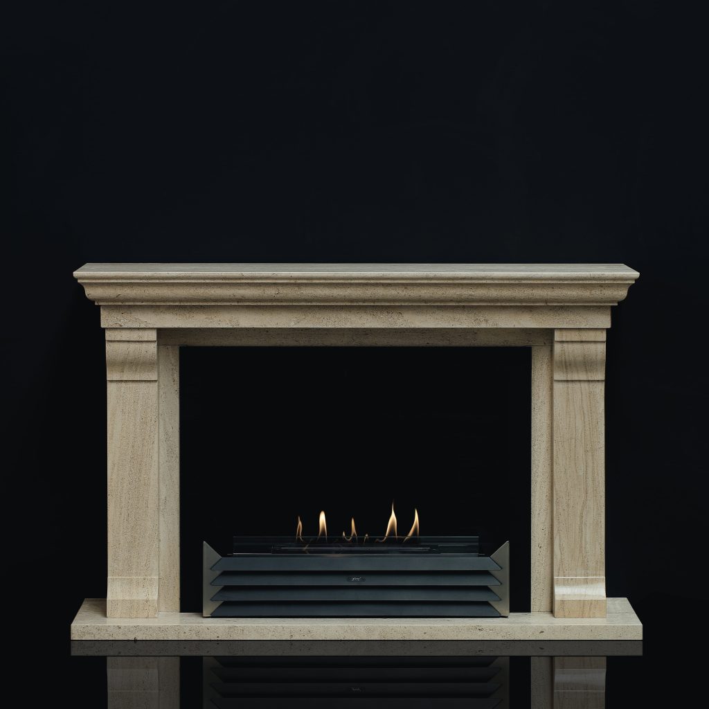 York bioethanol fireplace insert fitted in a classic stone mantel, by GlammFire, with a clean and elegant flame.