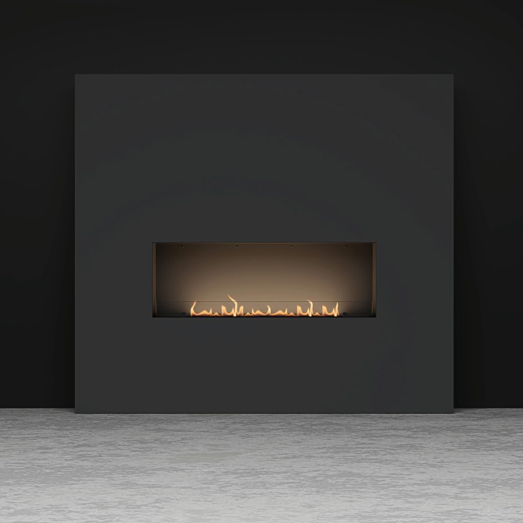 GlammBox EVOPlus bioethanol fireplace seamlessly integrated into a modern wall in a studio setting.