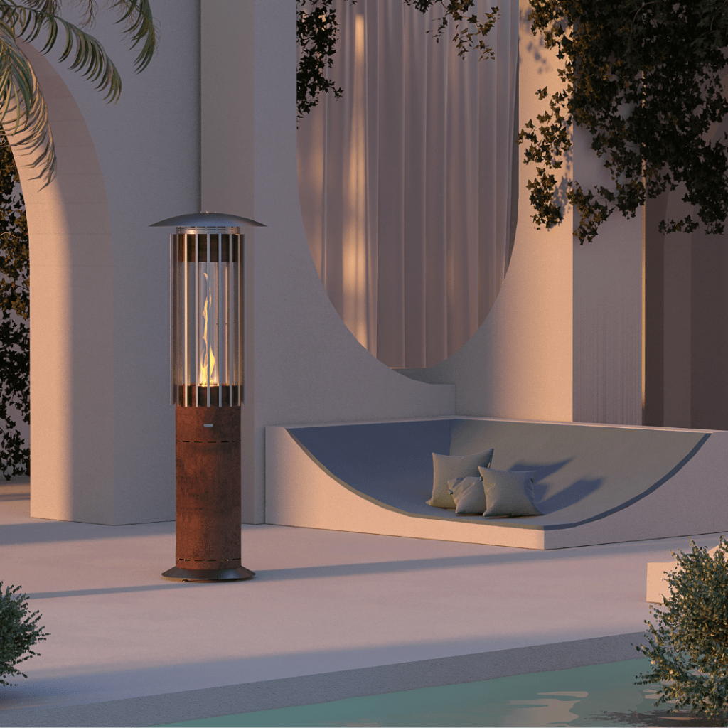 Hyperion Tile outdoor gas heater by GlammFire in a modern lounge setting, featuring a sleek industrial design with a rust finish.