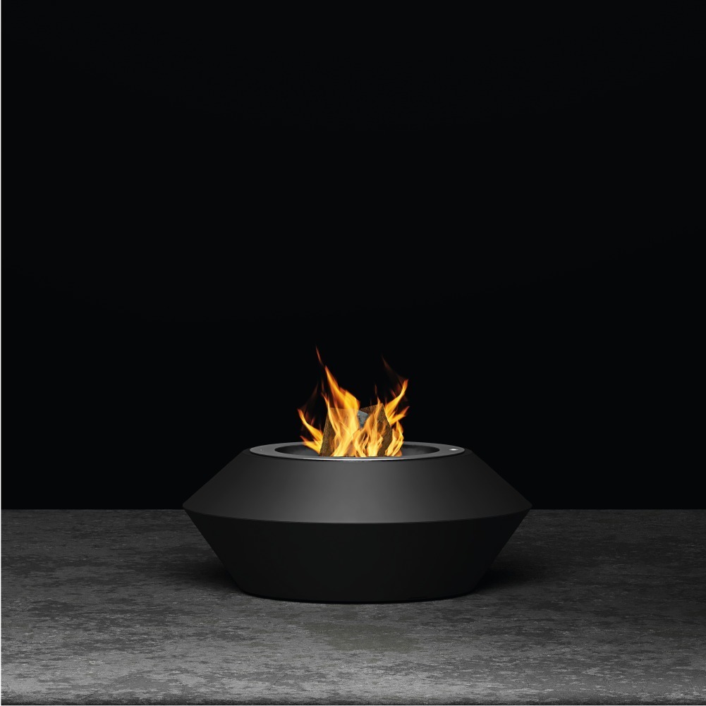 Operetta fire pit with a wood-burning zone in a sleek studio setting.