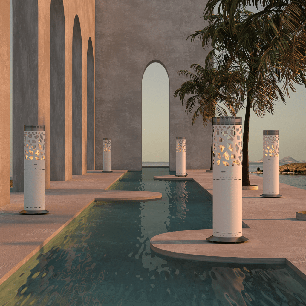 Outdoor gas heaters Selene Tile by GlammFire, featuring an intricate white cylindrical design, placed in a serene architectural setting, perfect for modern outdoor spaces.
