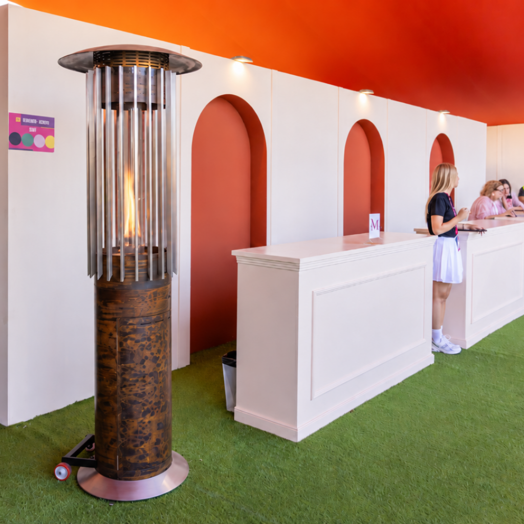 Hedges Hyperion gas patio heater by GlammFire in a contemporary hospitality and event setting