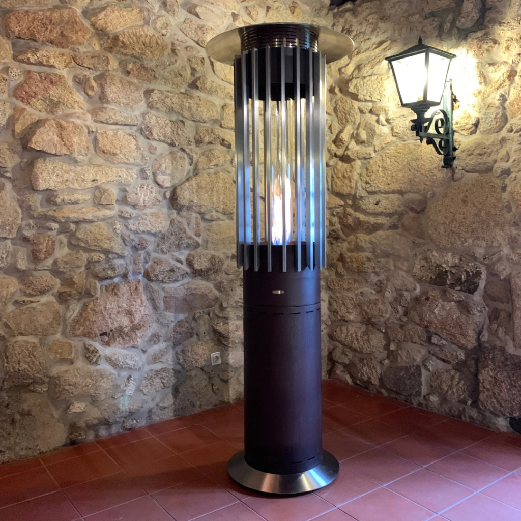 Hedges Hyperion gas patio heater by GlammFire in a contemporary hospitality and event setting