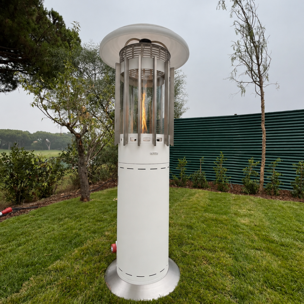 Selene Hedges gas patio heater by GlammFire in a landscaped contemporary garden