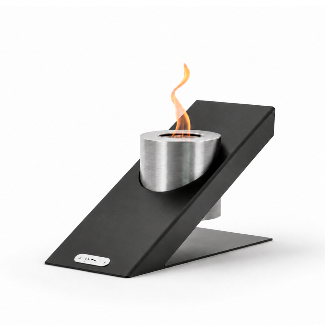 Oblique Single tabletop bioethanol fireplace by GlammFire in black lacquered steel with visible flame