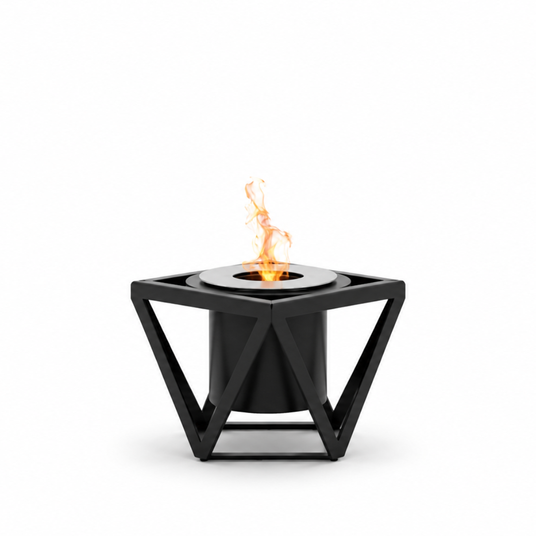 Alquimia tabletop bioethanol fireplace by GlammFire with geometric black structure and visible flame