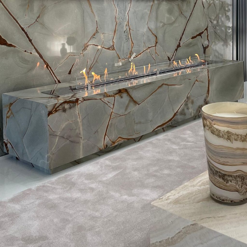 Fire Line EVOPlus bioethanol fireplace with sleek black design and visible flame.