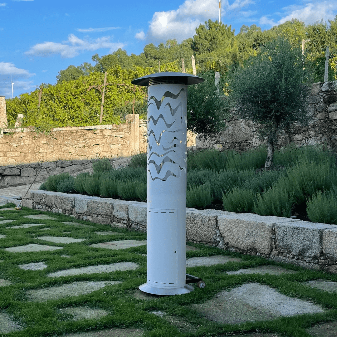 Samba Hyperion gas patio heater by GlammFire in a landscaped contemporary garden