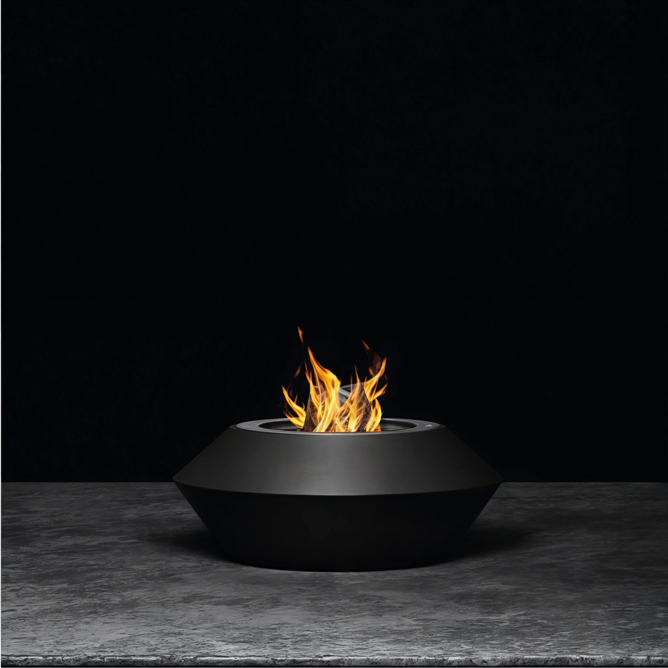 Operetta fire pit with a sleek black lacquered steel finish in a minimalist studio setting.