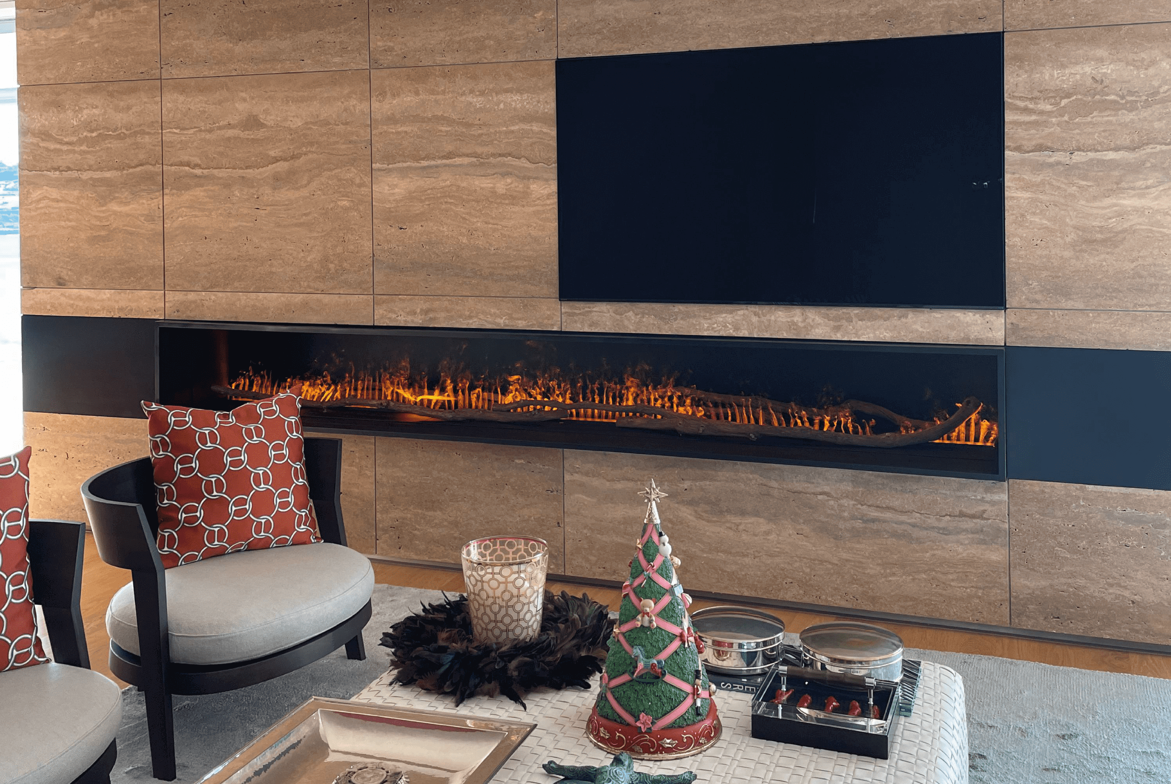 GlammBox electric fireplace by GlammFire in a modern living room with marble wall design.