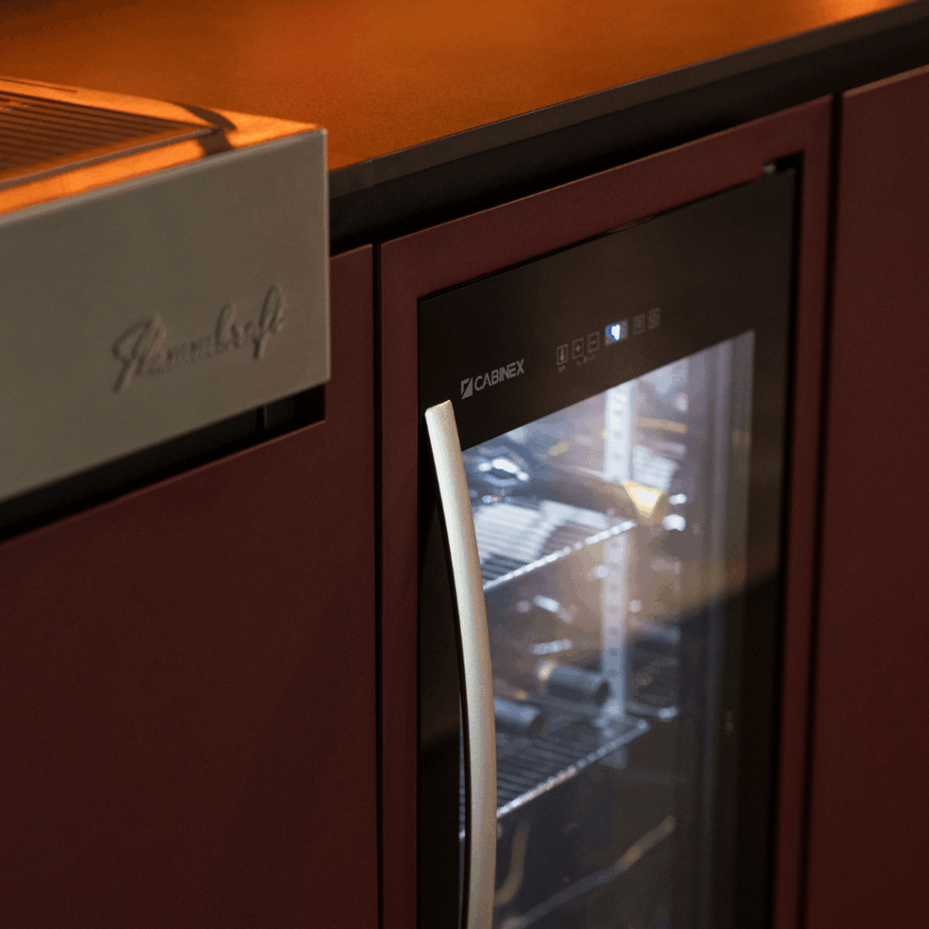 Nero Plus outdoor kitchen wine cooler detail integrated into modular cabinetry by GlammFire