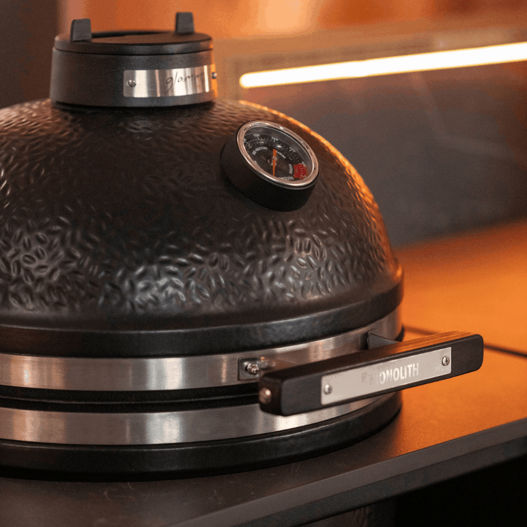 Nero Plus outdoor kitchen with Monolith kamado grill integrated into GLA Outdoor Kitchens composition by GlammFire