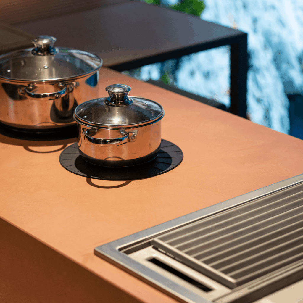 Close-up of cookware and grill surface on Brezza outdoor kitchen by GlammFire
