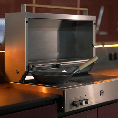 Close-up of Nero Plus outdoor kitchen grill module with stainless steel cooking system by GlammFire