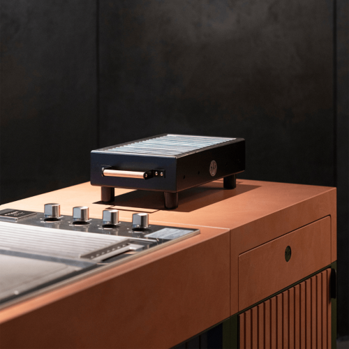Close-up of Brezza outdoor kitchen grill, hob and worktop by GlammFire