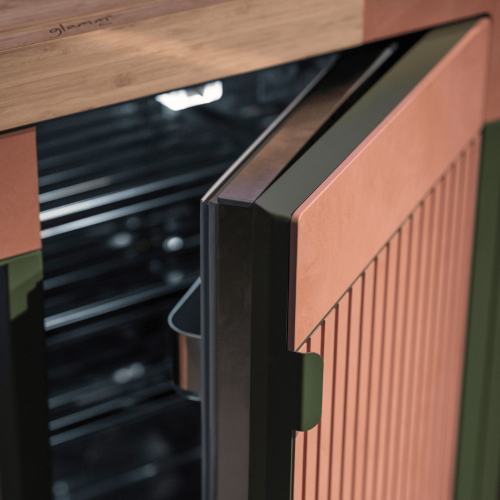 Detail of Brezza outdoor kitchen cabinet and integrated refrigeration by GlammFire