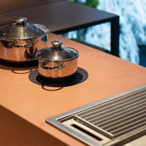 Close-up of cookware and grill surface on Brezza outdoor kitchen by GlammFire