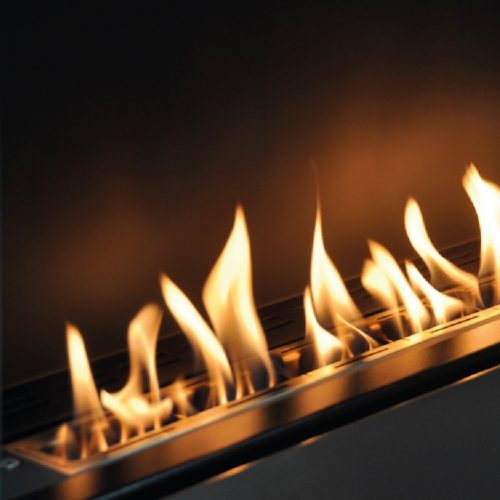Close-up of the flames from the Apollo bioethanol wall-mounted fireplace by GlammFire, showcasing a modern and eco-friendly flame effect.