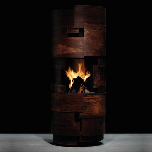 Barbecue Intermezzo by GlammFire in a modern rustic design, featuring a cylindrical shape with a warm fire glow, ideal for outdoor gatherings and grilling.