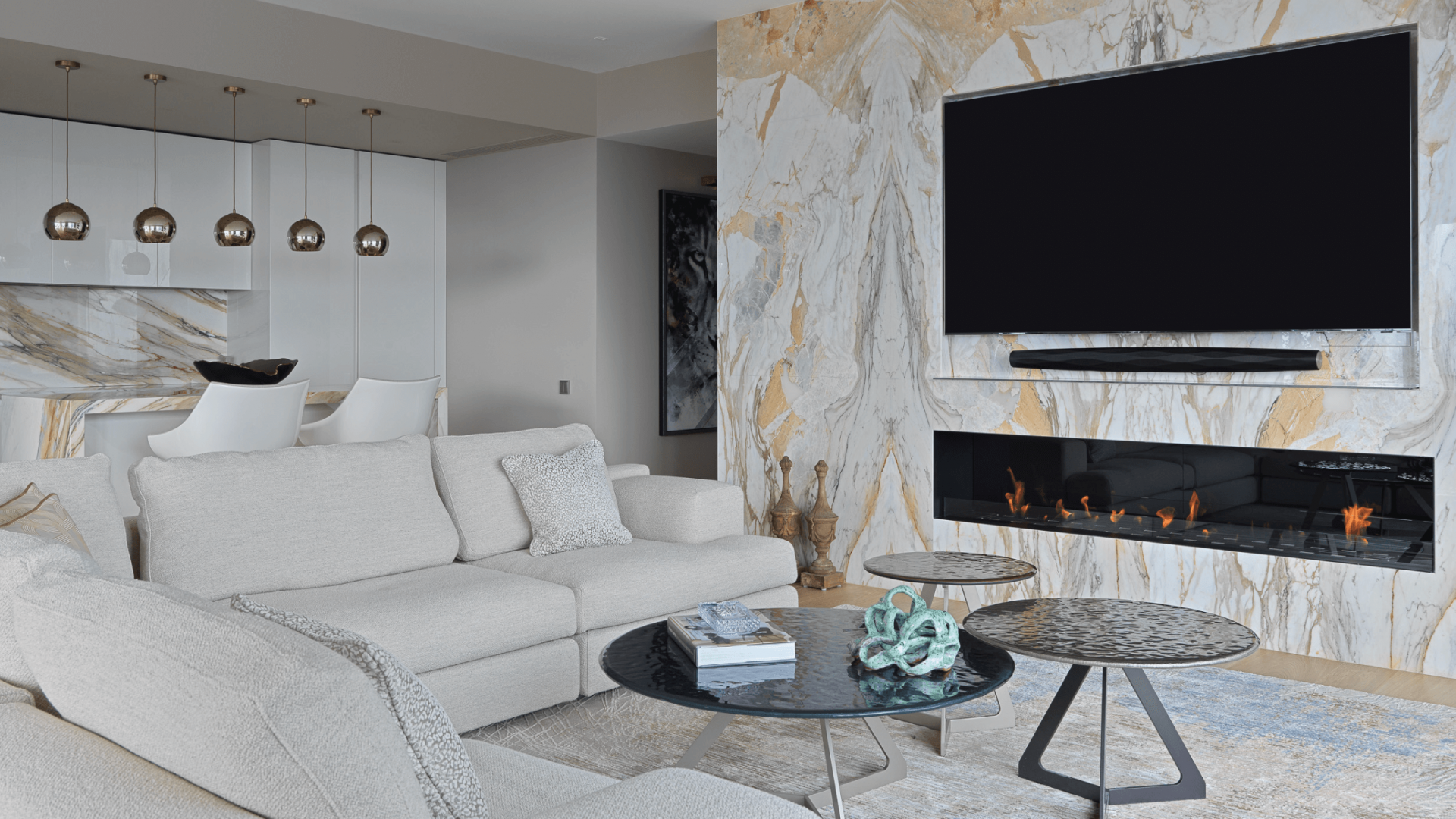 Glammbox built-in bioethanol fireplace in a room with marble walls and luxurious details