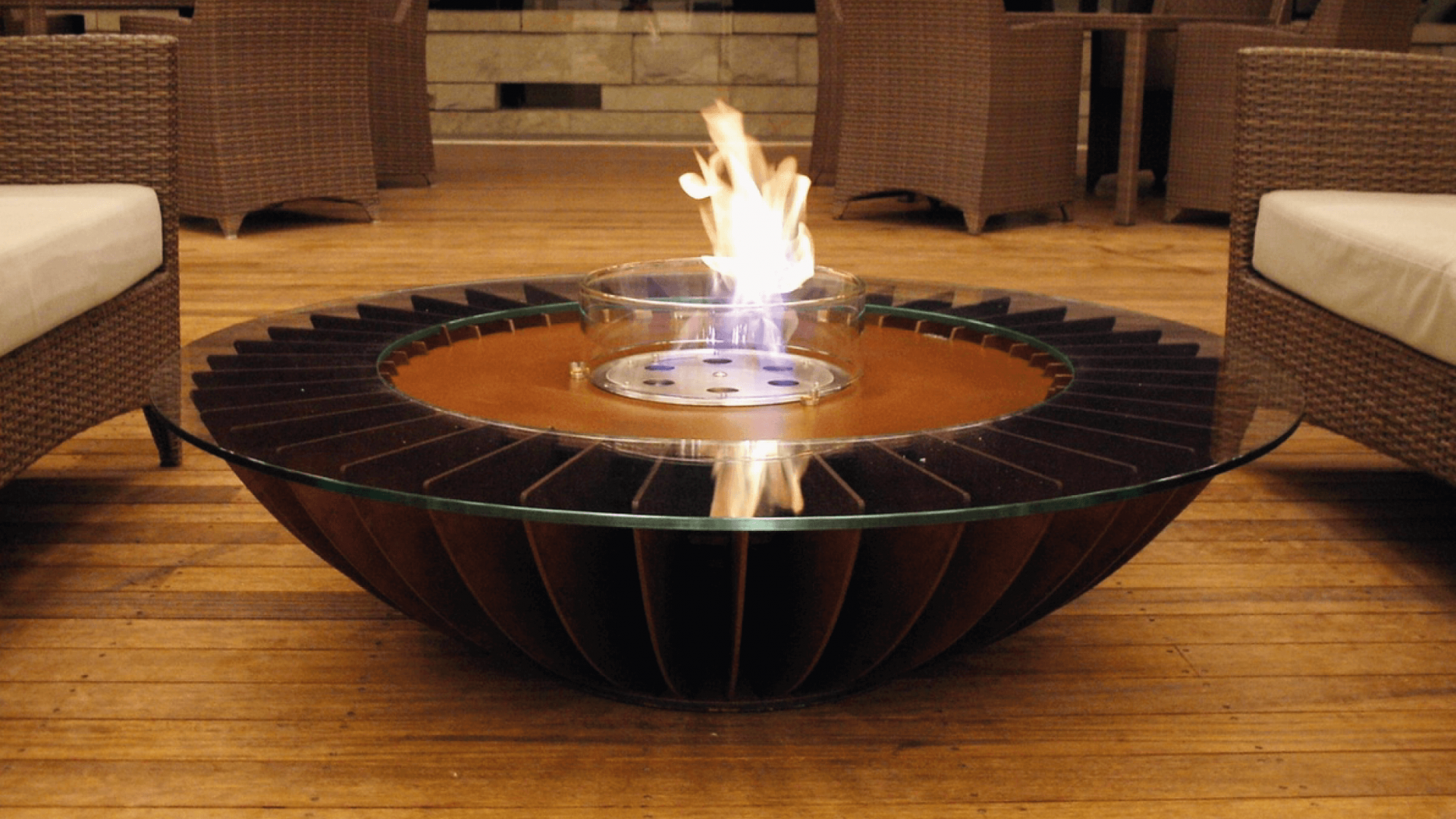 Cosmo fire pit in a Club House in South Korea, featuring a modern design with a glass top and bioethanol flame.
