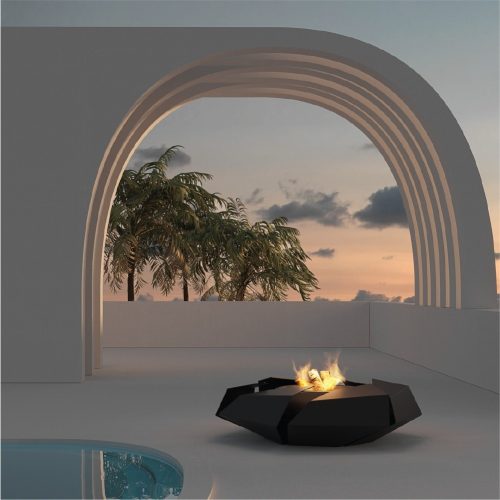 Stravaganza fire pit by GlammFire in a modern outdoor setting at sunset
