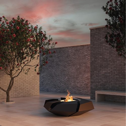 Stravaganza fire pit by GlammFire in a modern courtyard at sunset