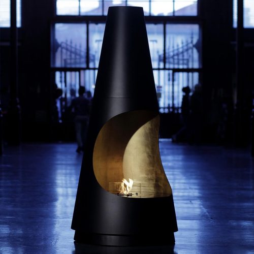 Archimedes bioethanol fireplace by GlammFire in a dramatic indoor setting