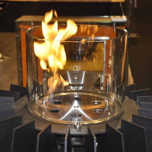 Burner I bioethanol mechanical burner by GlammFire with visible flame in glass enclosure